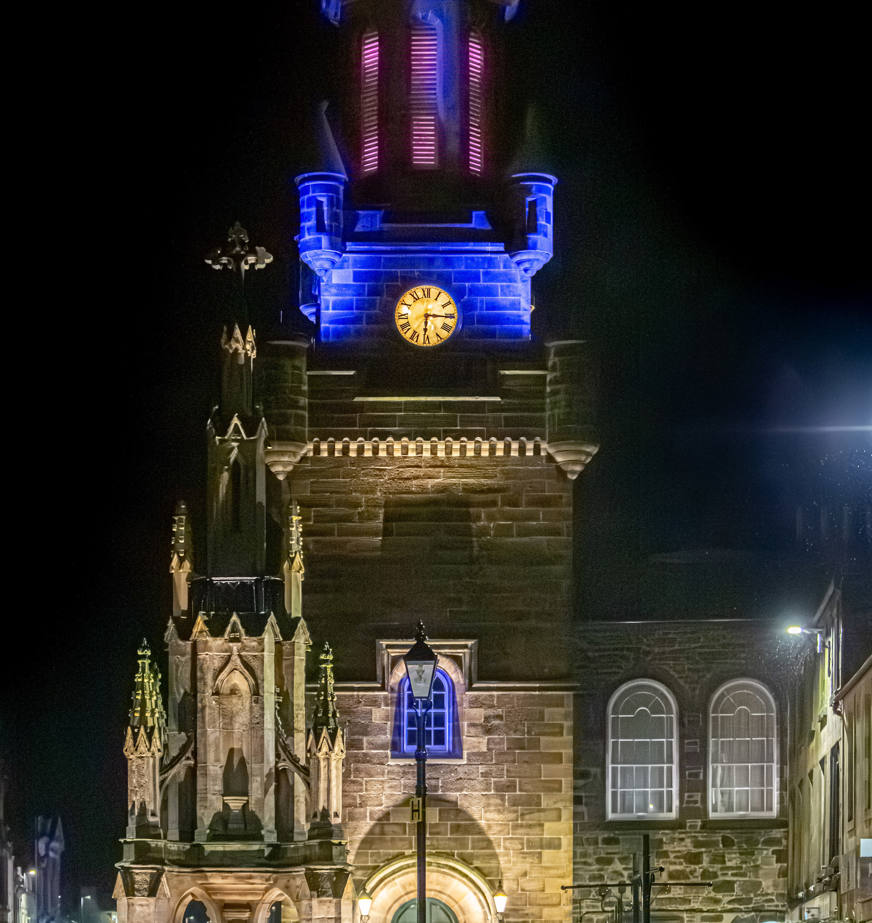 Floodlights illuminate the tower of Forres Tolbooth